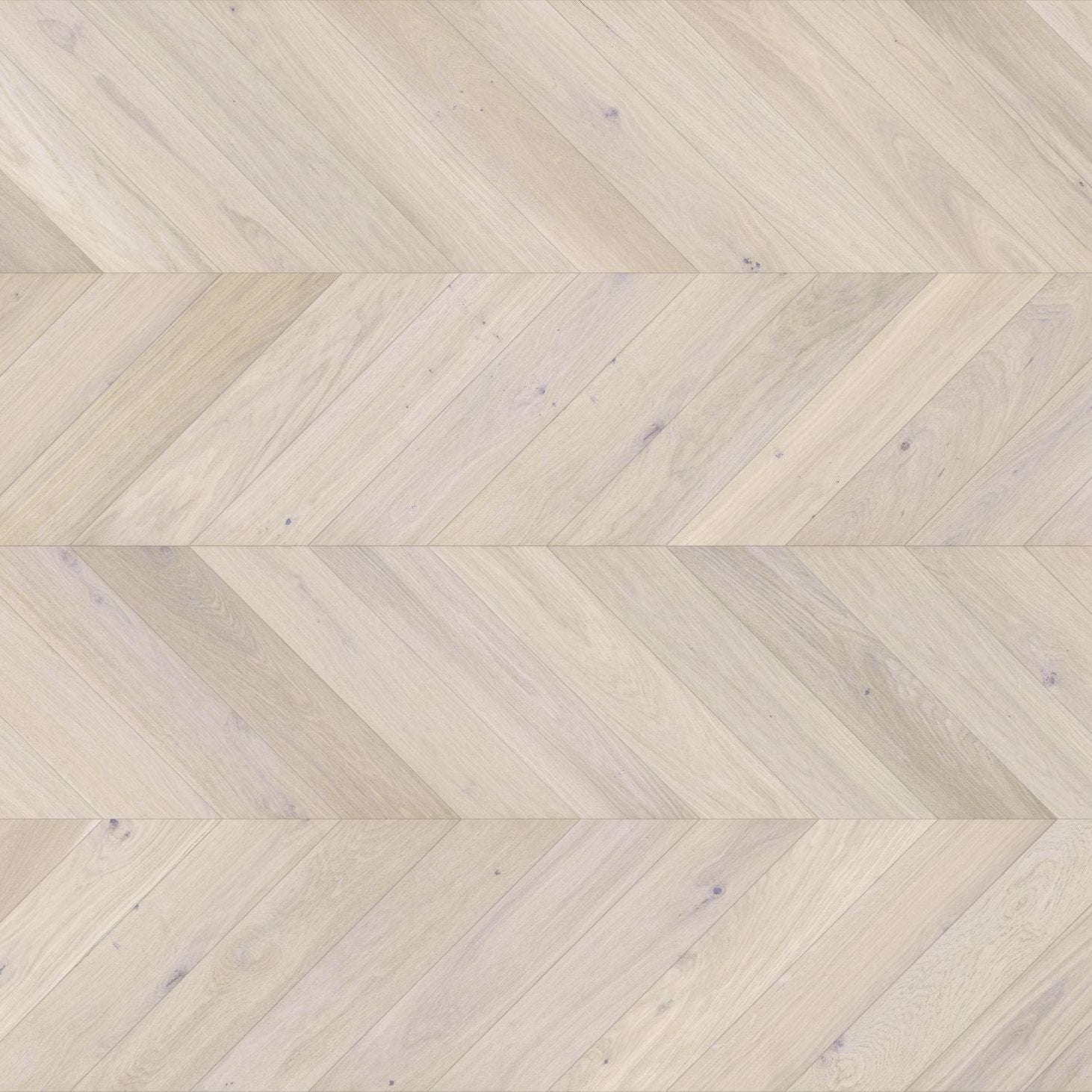 Luxury light wood flooring laid in chevron pattern