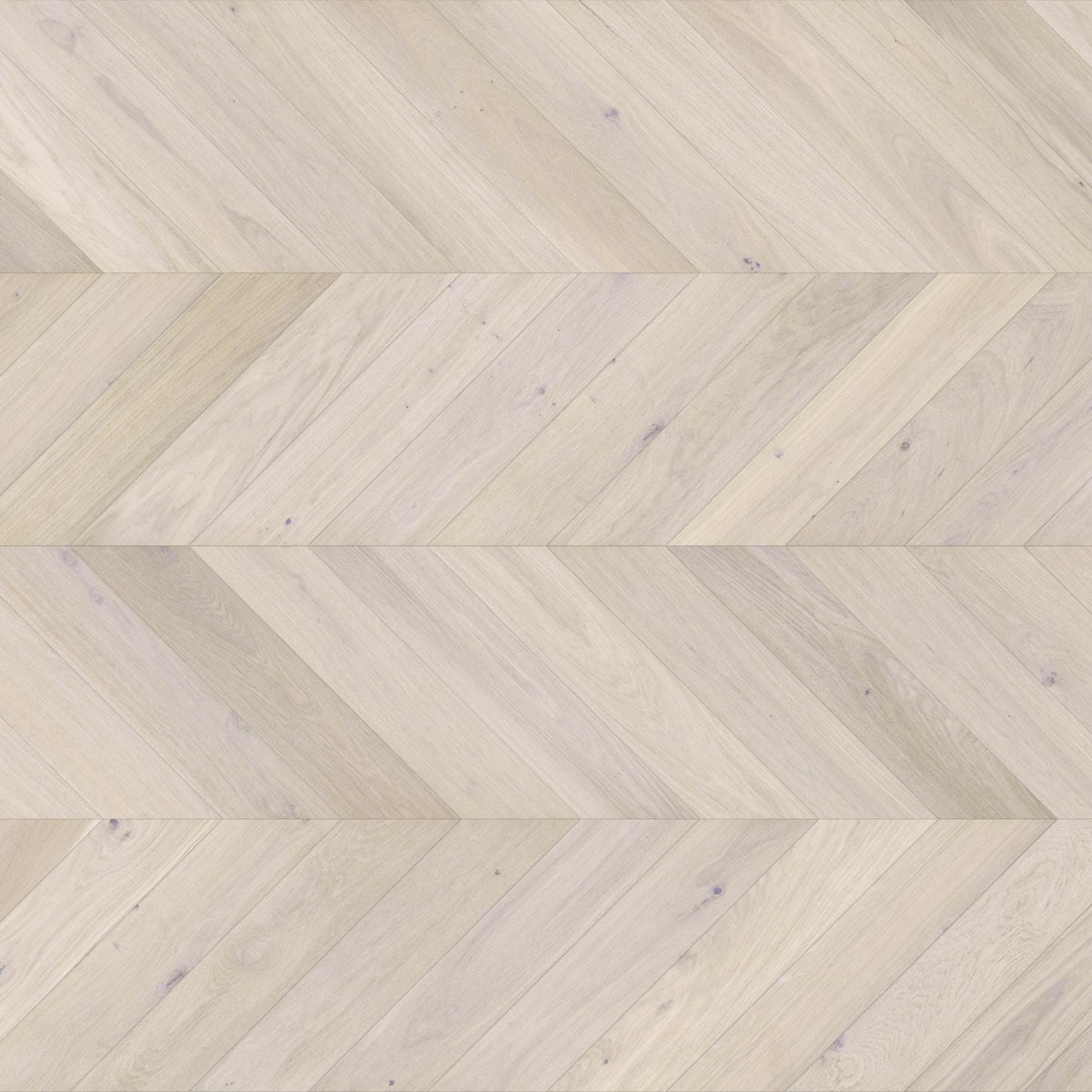 Luxury light wood flooring laid in chevron pattern